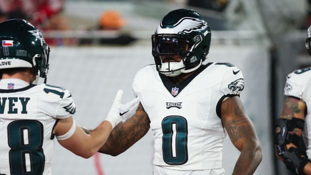 Jan 15, 2024; Tampa, Florida, USA; Philadelphia Eagles running back D'Andre Swift (0) greets wide receiver Britain Covey (18) during warm ups before a 2024 NFC wild card game at Raymond James Stadium. (Kim Klement Neitzel / USA TODAY Sports).